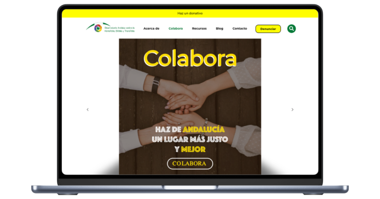 Un ordenador portátil abierto mostrando la plataforma del Observatorio Andaluz LGTBI, destacando su sistema accesible de reporte de incidentes y su diseño institucional limpio.